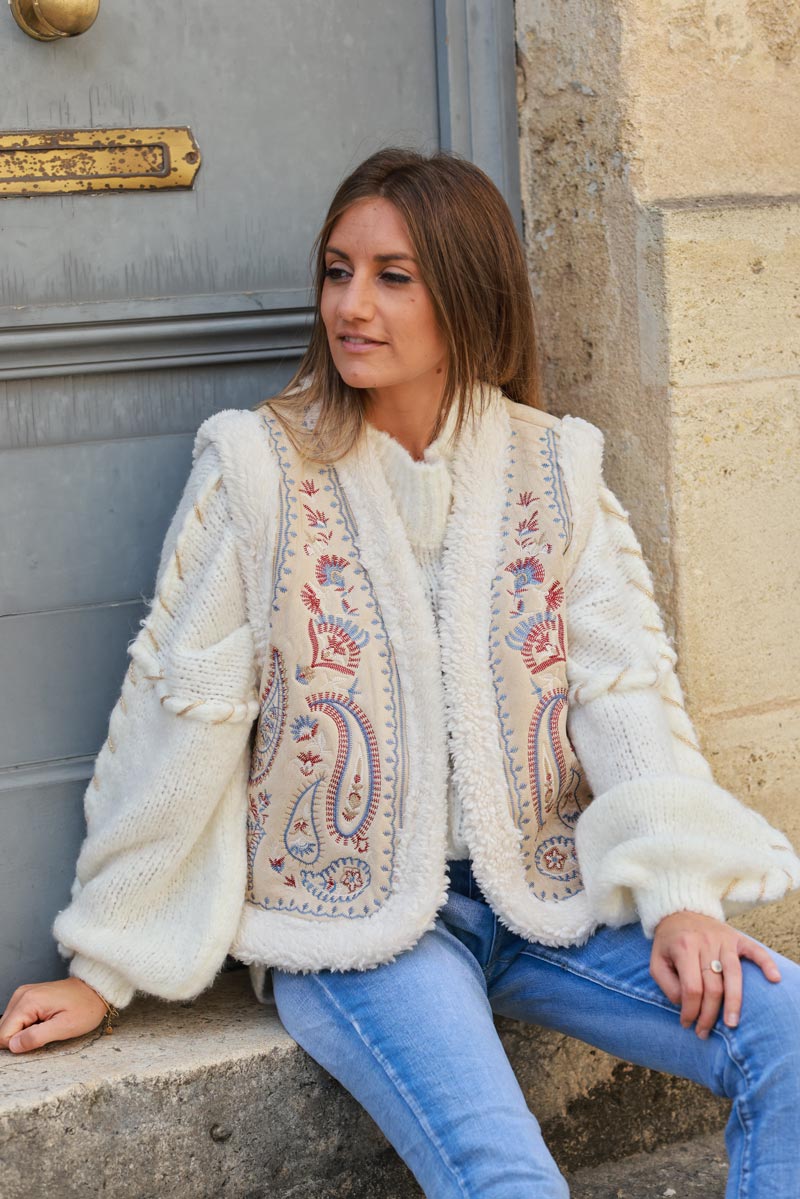 Beige suedette and faux sheepskin gilet with floral embroidery details