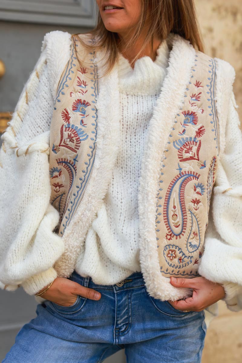 Beige suedette and faux sheepskin gilet with floral embroidery details