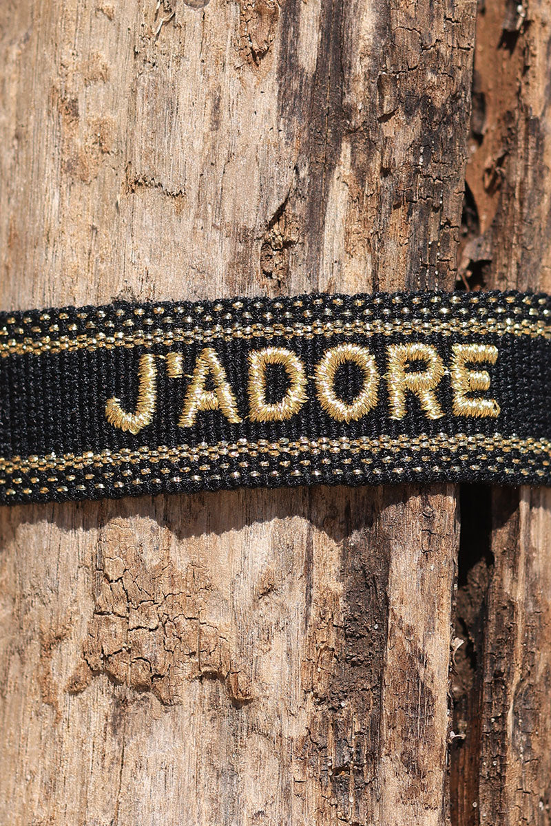 Black fabric bracelet with gold 'J'adore' embroidery 