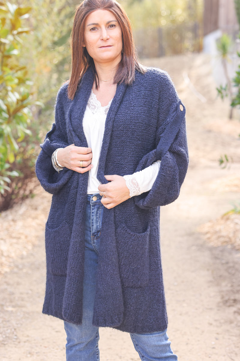 Navy blue chunky knit cardigan with turn up sleeves and wooden buttons